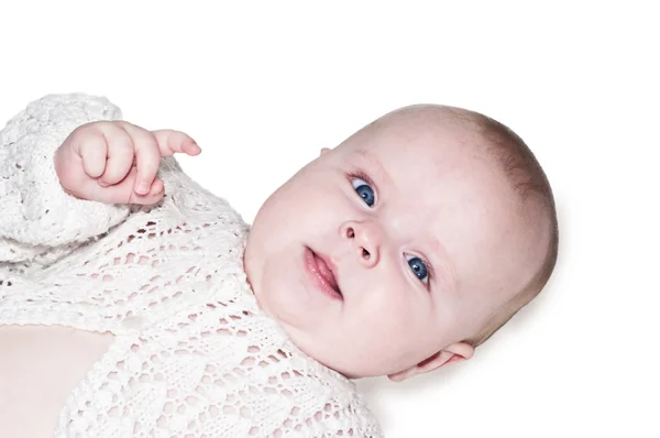 Porträt eines hübschen Babys in Weiß — Stockfoto