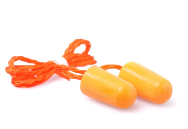 Tampões de ouvido laranja — Fotografia de Stock