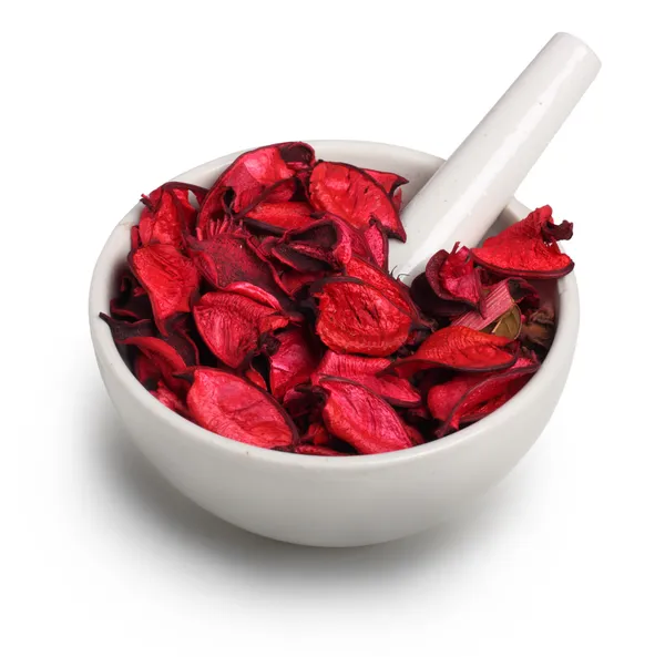 Mortar with dry rose petals — Stock Photo, Image