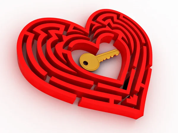 Klucz w centrum labiryntu w formie serca — Zdjęcie stockowe