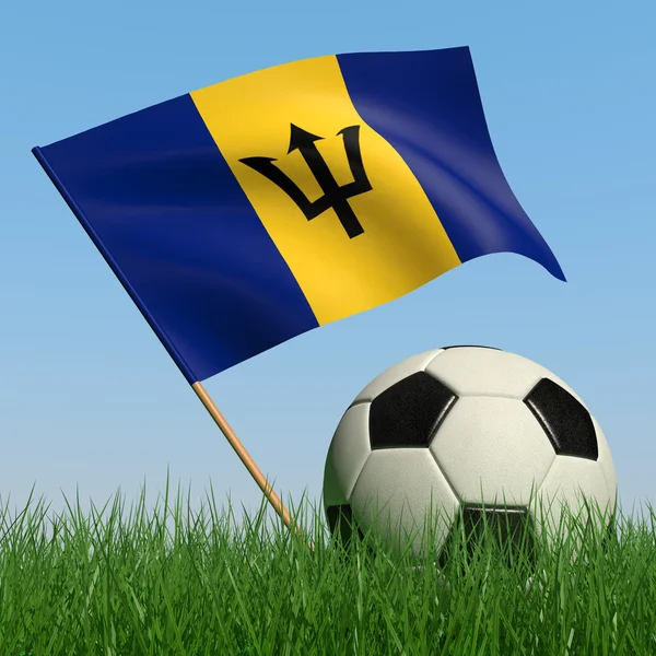 Bola de futebol na grama e a bandeira de Barbados — Fotografia de Stock