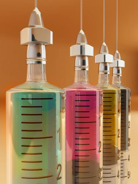 Four syringe with paints. CMYK. Conceptual images — Stock Photo, Image