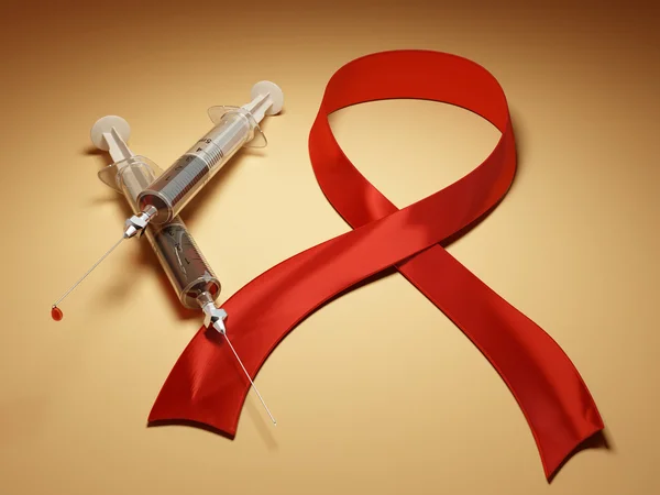 AIDS. injekční stříkačky s krví a červenou stužku — Stock fotografie