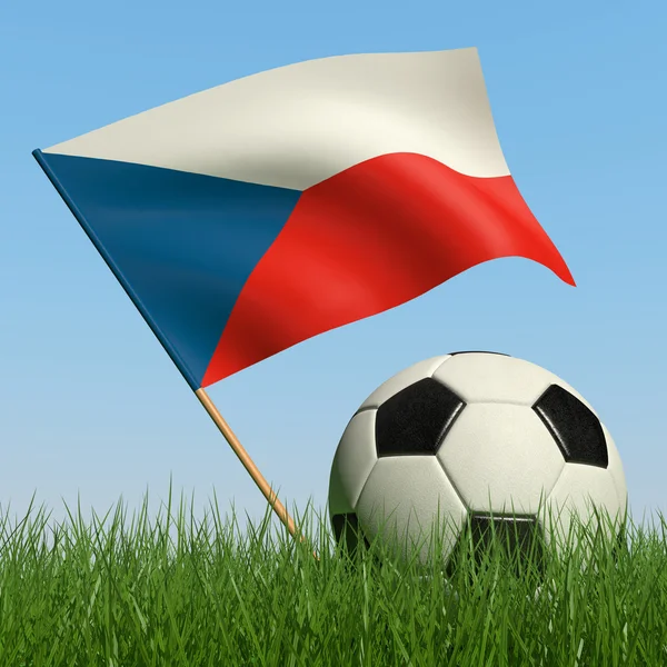 Fotbalový míč v trávě a vlajka České republiky. — Stock fotografie
