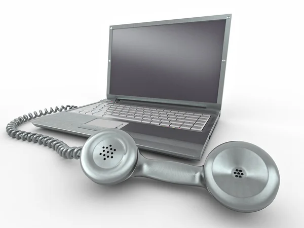 Přenosný počítač s staromódní telefon reciever — Stock fotografie