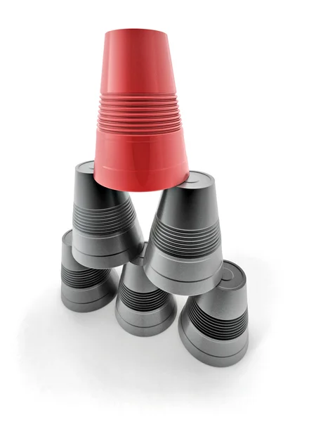 Піраміда з перевернутих пластикових чашок на ізольованому фоні — стокове фото