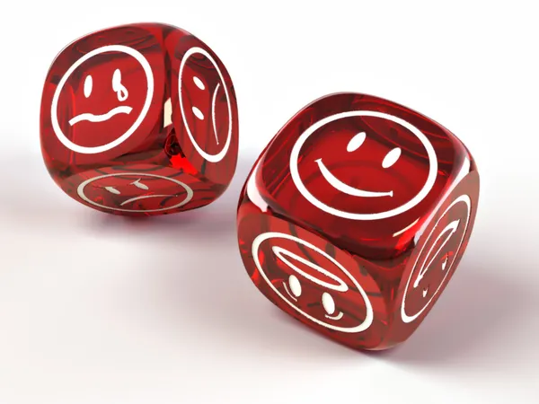 Dice with different emotions on faces — Stock Photo, Image