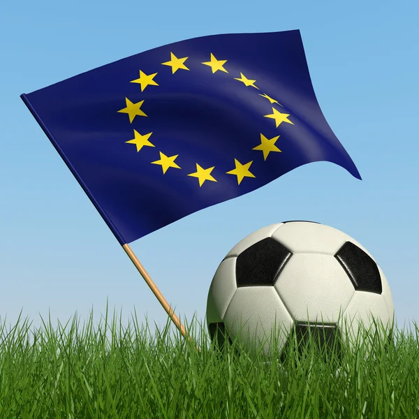 Balón de fútbol en el césped y bandera de la Unión Europea . —  Fotos de Stock