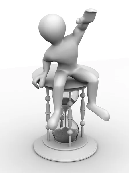Man sitting on hourglass — Stock Photo, Image