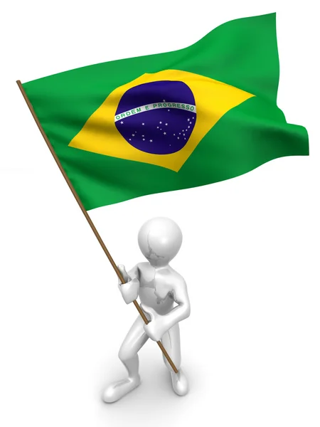 Чоловіки з прапором. Бразилія — стокове фото