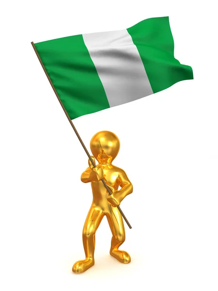 Люди с флагом. Нигерия — стоковое фото