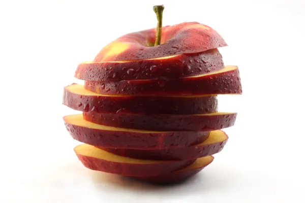 La pomme rouge tranchée — Photo