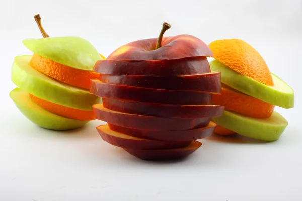 The sliced apples and orange — Stock Photo, Image