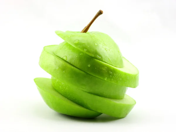 Нарезанное зеленое яблоко — стоковое фото