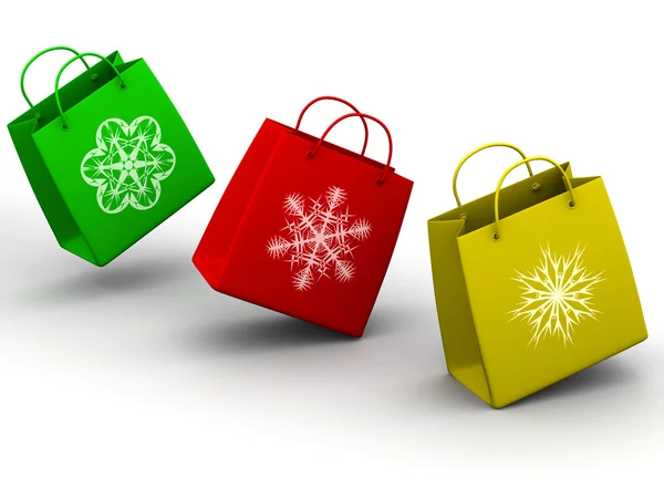 Shopping tassen met sneeuwvlokken — Stockfoto