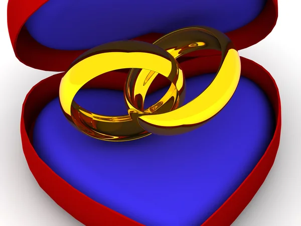 Box as heart with wedding rings — Stock Photo, Image
