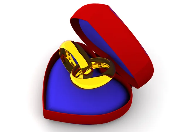 Caixa como coração com anéis de casamento — Fotografia de Stock