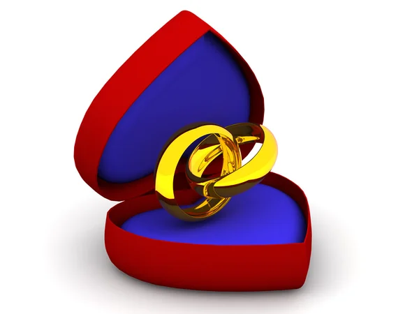 Caixa como coração com anéis de casamento — Fotografia de Stock