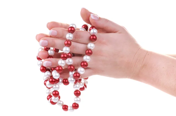 Beautiful feminine hands with necklace — Stock Photo, Image