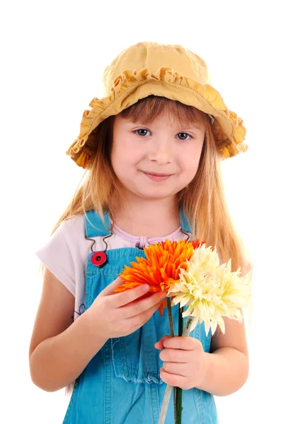 Klein meisje met bloemen — Stockfoto