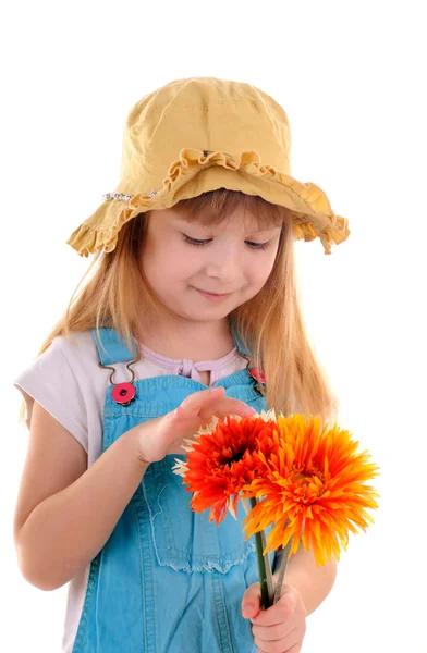 Menina pequena com flores — Fotografia de Stock