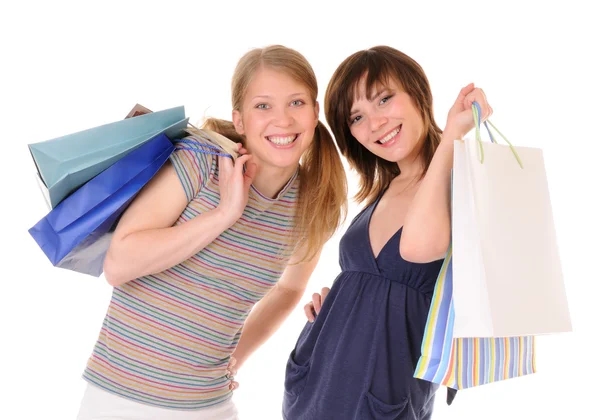 Two young women with purchases — Stock Photo, Image