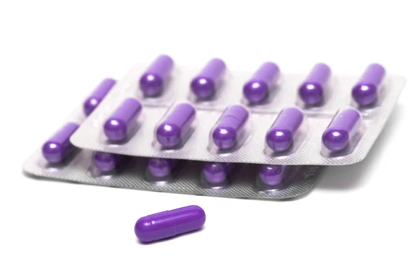 Paquets de pilules isolés sur fond blanc — Photo