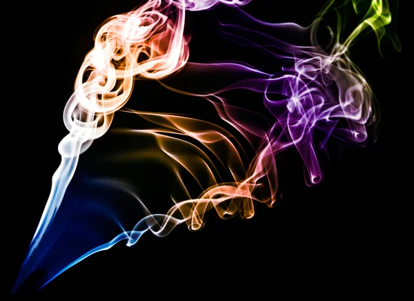Coloured smoke on black background — Stock Photo, Image