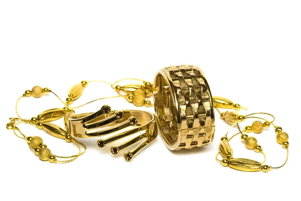 Goldene Armbänder — Stockfoto
