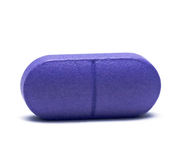 Pílula isolada no fundo branco — Fotografia de Stock