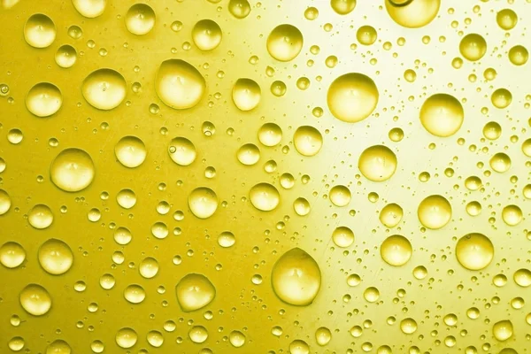 Yellow water drops for background — Stock Photo, Image