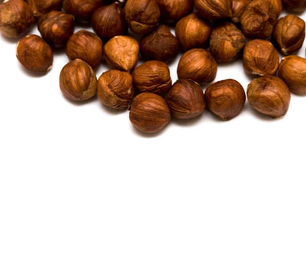 Many hazelnuts isolated — Stock Photo, Image