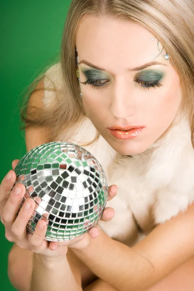 Beautiful girl with silver ball — Stock Photo, Image