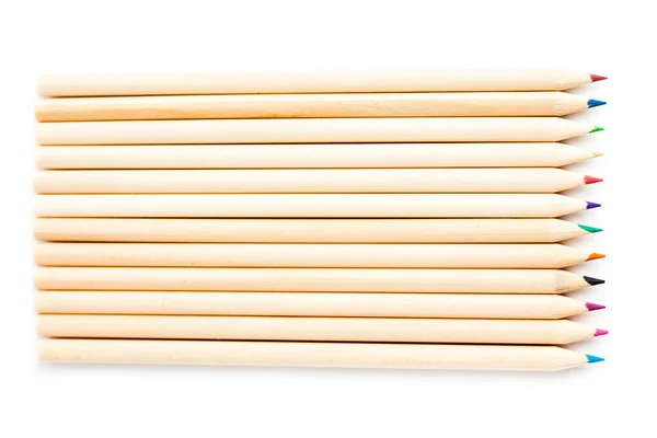 Sok színes ceruzák, sorban át fehér háttér — Stock Fotó