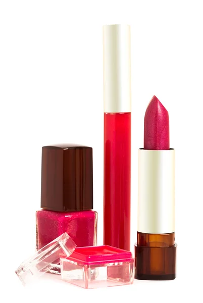 Lipstick, gloss for lips and enamel — Stock Photo, Image