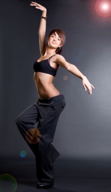 Dancer girl with a slim figure