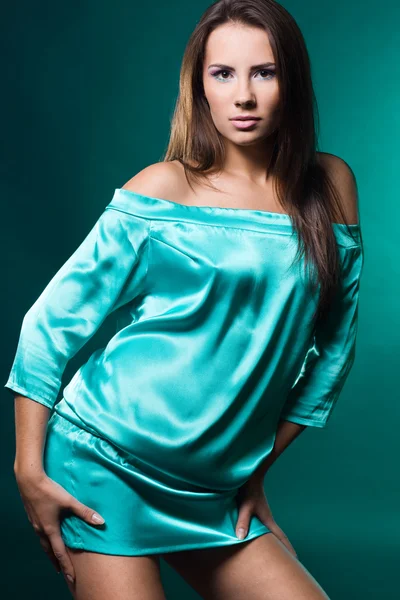 Fashionable woman on blue background — Stock Photo, Image