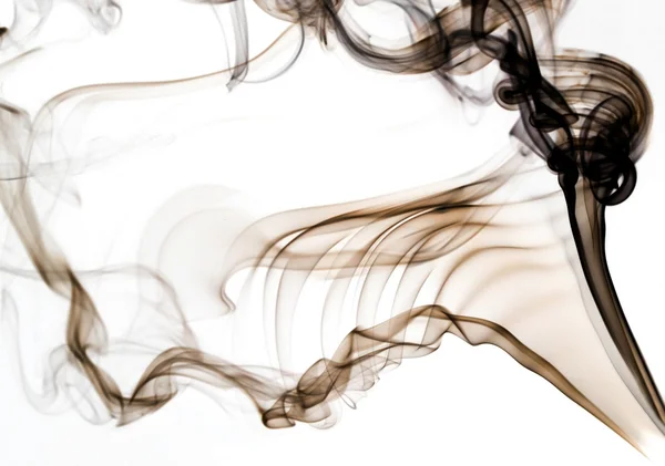 Brauner Rauch auf weißem Hintergrund — Stockfoto