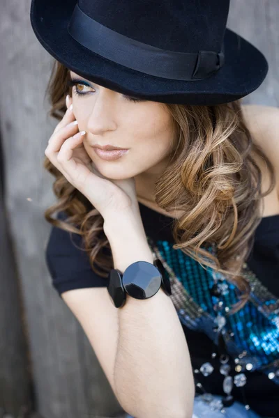 Fashionable woman is in a hat — Stock Photo, Image