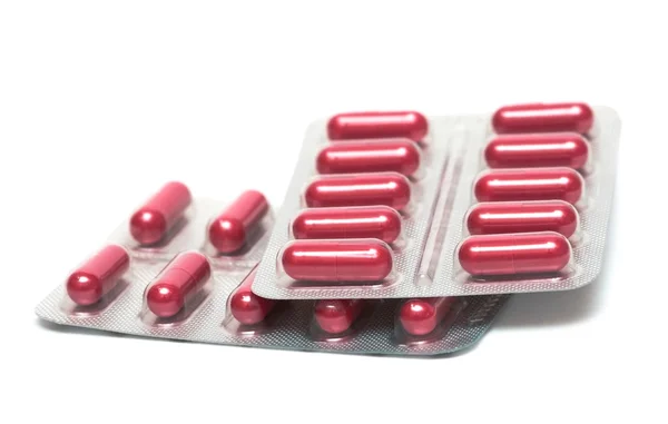 Confezioni di pillole isolate su sfondo bianco — Foto Stock