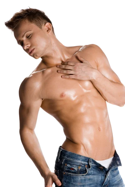 Giovane bodybuilder uomo su sfondo bianco — Foto Stock