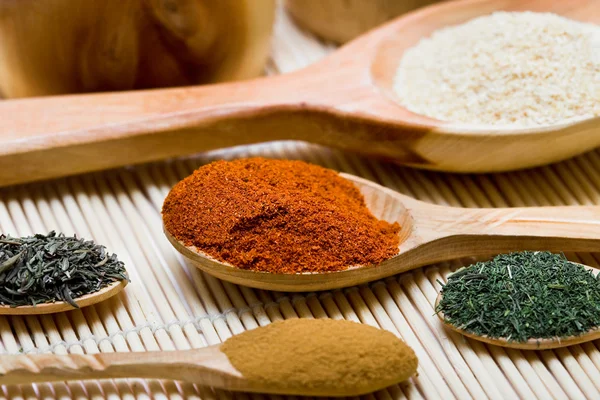 Many different spices in spoons — Stock Photo, Image