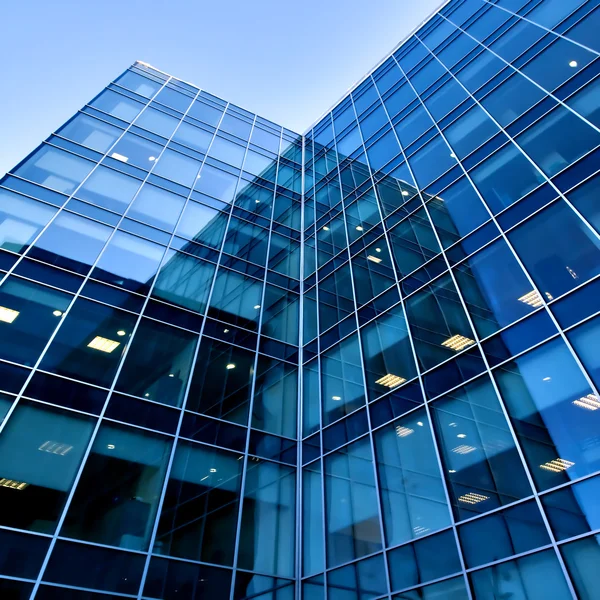 Glass silhouettes of skyscrapers at night — Stock Photo, Image