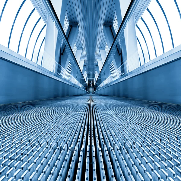 Moving escalator in square composition — Stock Photo, Image