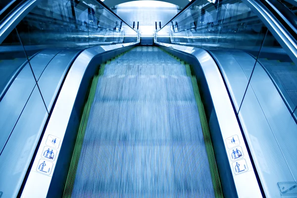 Moving escalator in the office hall — Stock Photo, Image