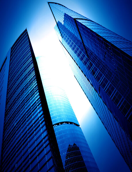 Modern glass silhouettes of skyscrapers at night