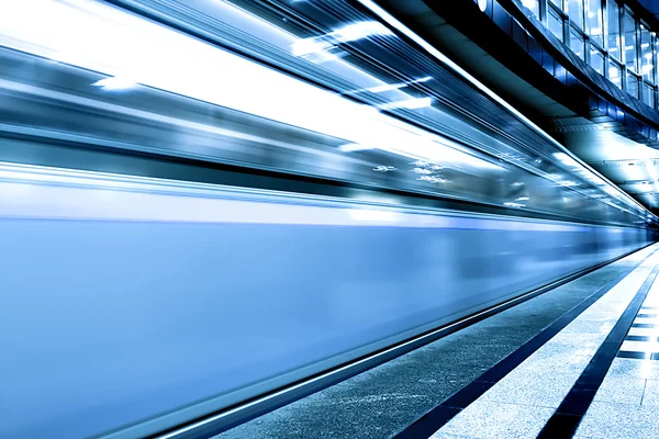 Fast moving train by motion — Stock Photo, Image