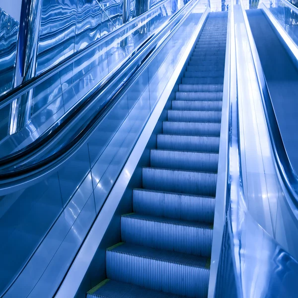 Moving escalator in airport — Stock Photo, Image