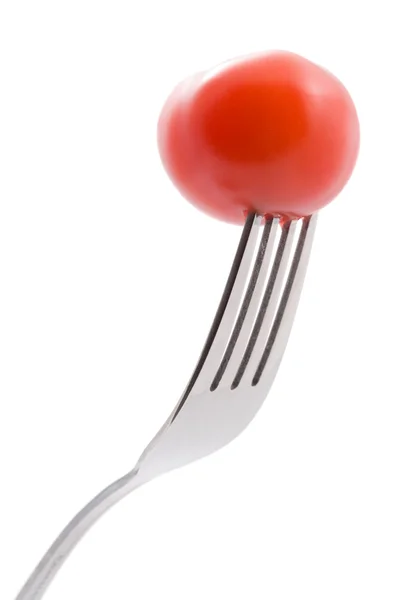 Tomate en tenedor aislado — Foto de Stock