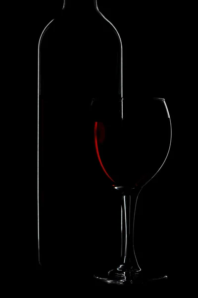 Garrafa de vinho e vidro isolado — Fotografia de Stock